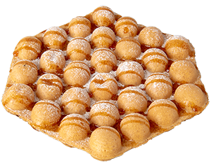 きつね色に焼かれたバブルワッフル。粉糖が軽くかかっている。